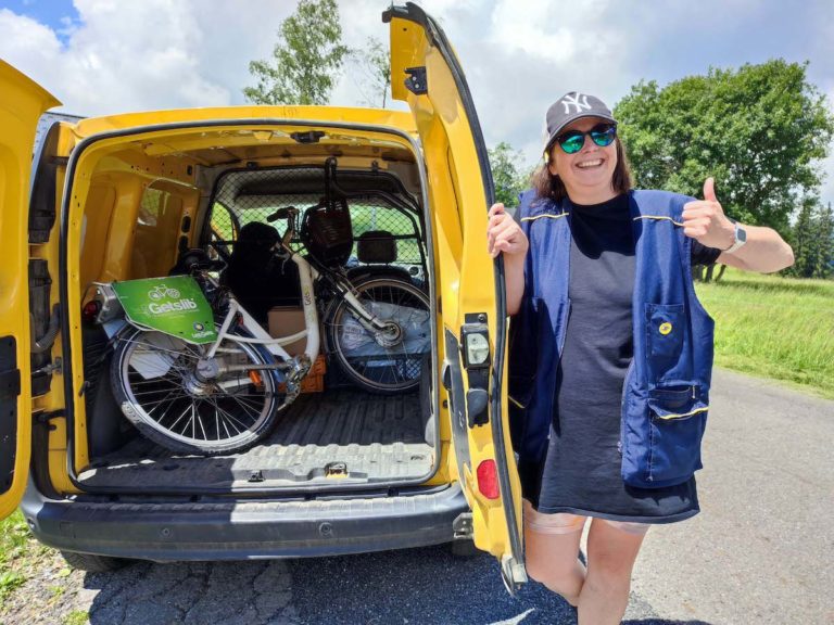 Postie Anne Marie Sainsbury with my dead ebike in her van